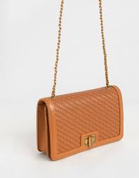"Saffron Weave Luxe: Textured Clutch Bag with Twist-Lock Charm"